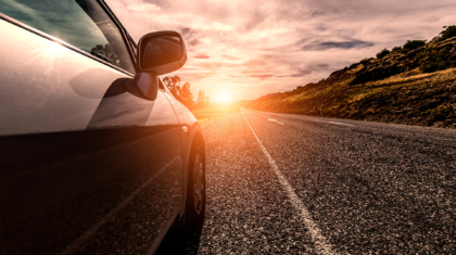 Car ride on road in sunny weather