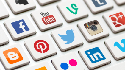 Modern Keyboard With Colored Social Network Buttons.